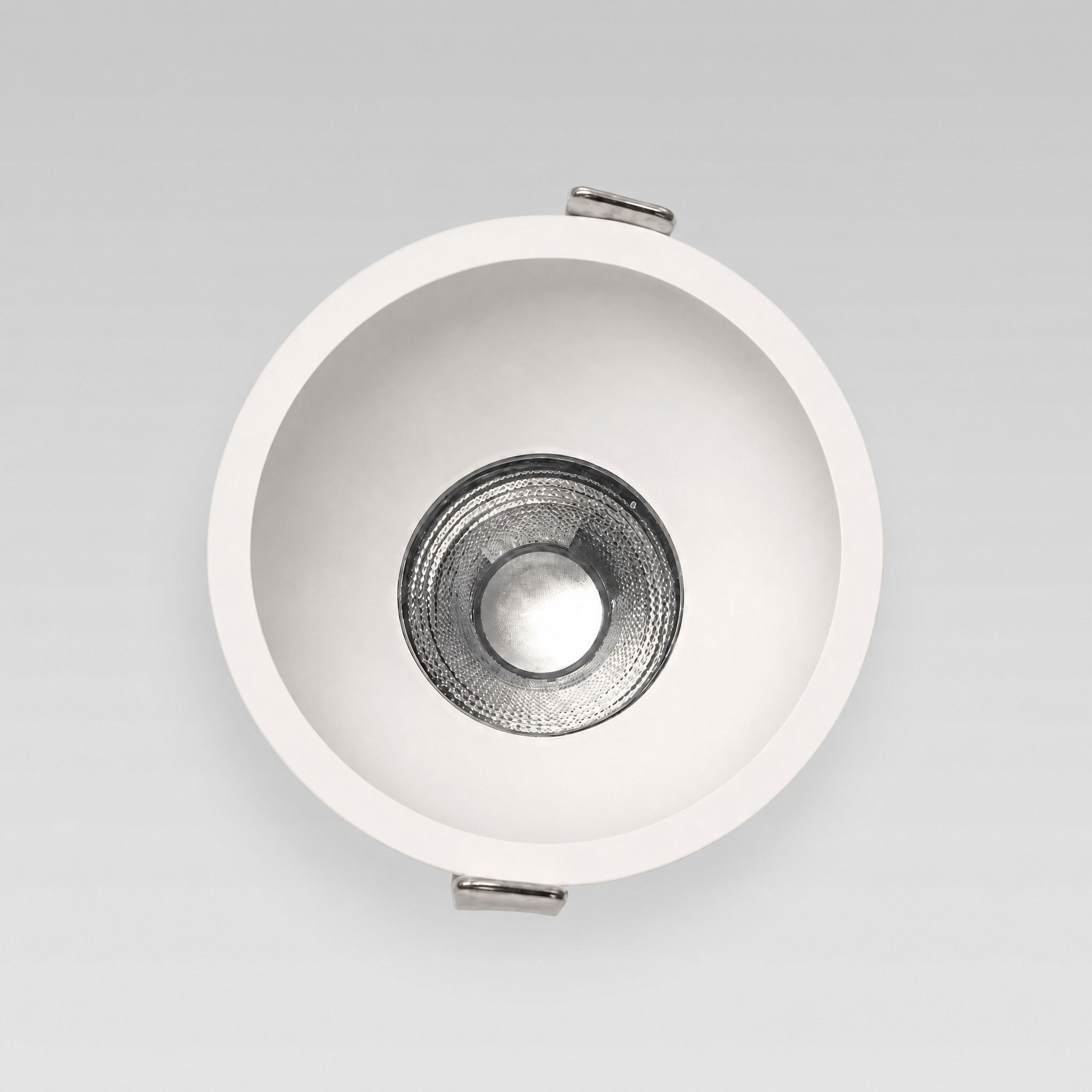 Coastal IP44 LED downlight — front view showing the matte white trim and faceted silver reflector